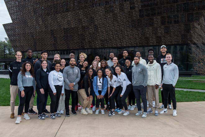 Jr.  NBA Court Of Leaders members in front of the National Museum of African American History and Culture.