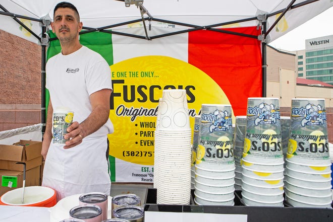 Joseph Stafferi, 4th generation owner and operator, prepares to serve Fusco's Original Italian Ice during the Wilmington Blue Rocks South Atlantic League home opener against the Hickory Crawdads at Frawley Stadium in Wilmington, Tuesday, April 11, 2023. Hickory won 3-2.