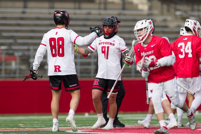 Bobby Russo, left, and Jon Dugenio, seniors on the Rutgers men's lacrosse team, have been best friends since pre-school.