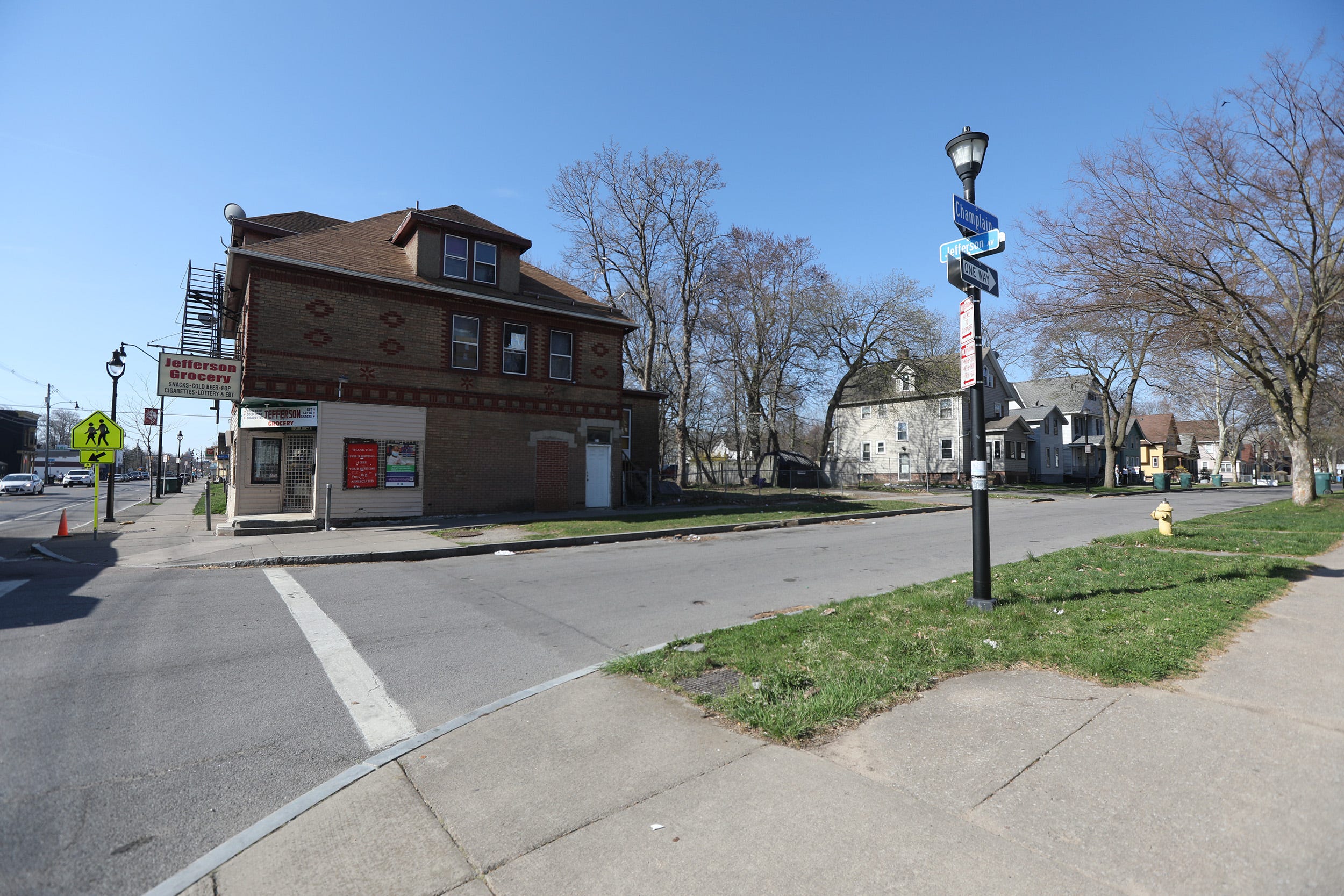 The corner of Champlain Street and Jefferson Avenue today, just four houses away from where Domonique Holley-Grisham went missing in 2009.