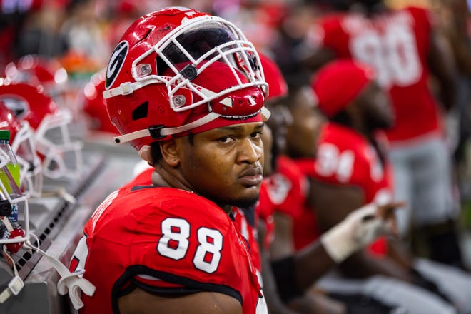 Jalen Carter falls, Bijan Robinson rises