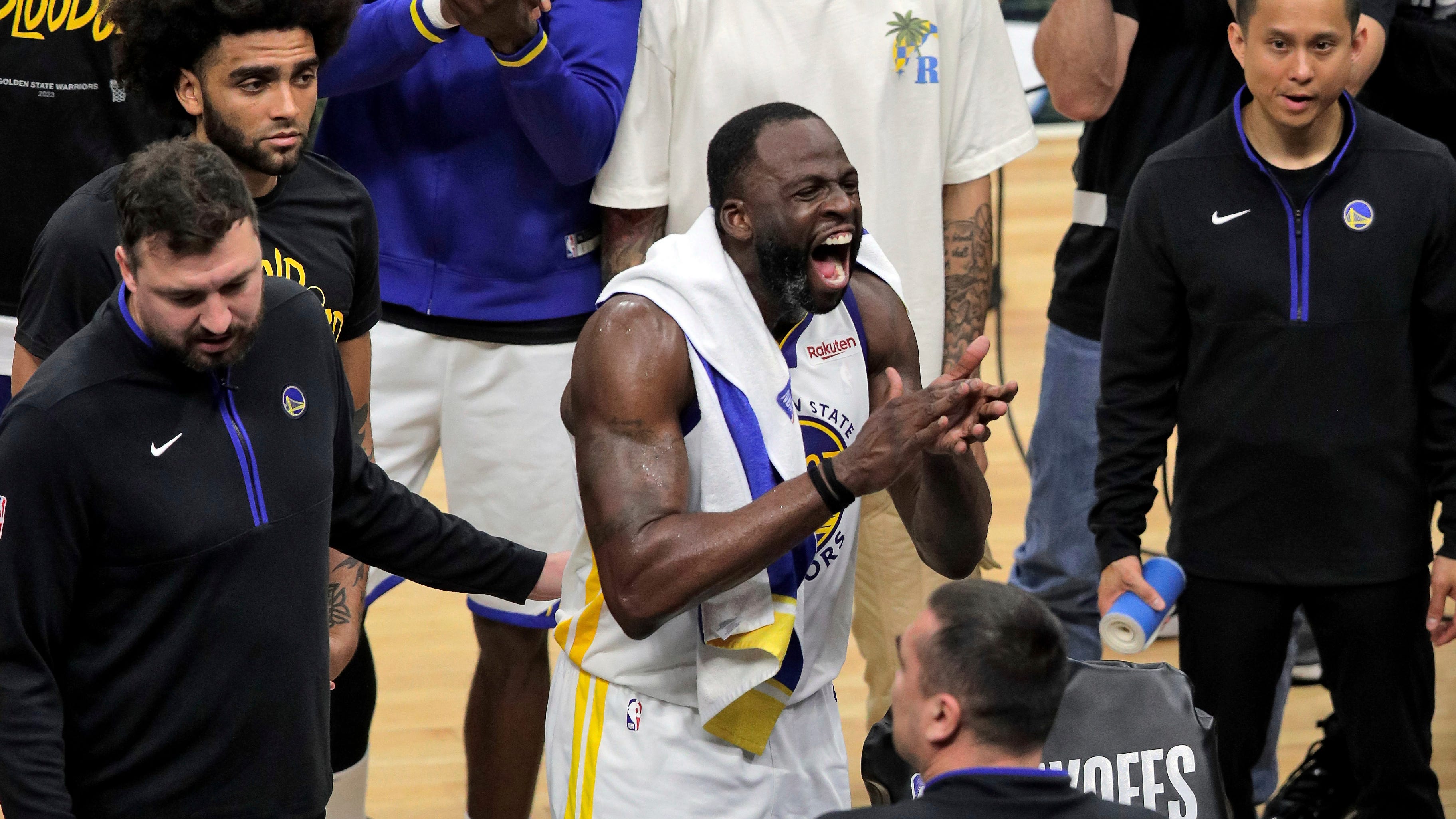 Golden State's Draymond Green reacts before he was ejected from the game after stomping on the chest of Sacramento's Domantas Sabonis.