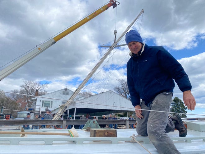 71-year-old local shipbuilding legend Paul Rawlins continues to work on projects such as the restoration of the 1965 sloop Cedar, which was launched in York Harbor on Wednesday.