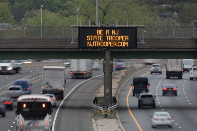 A NJDOT sign doing outreach for state police recruiting on Route 80 in Hackensack, NJ on Wednesday April 19, 2023. 