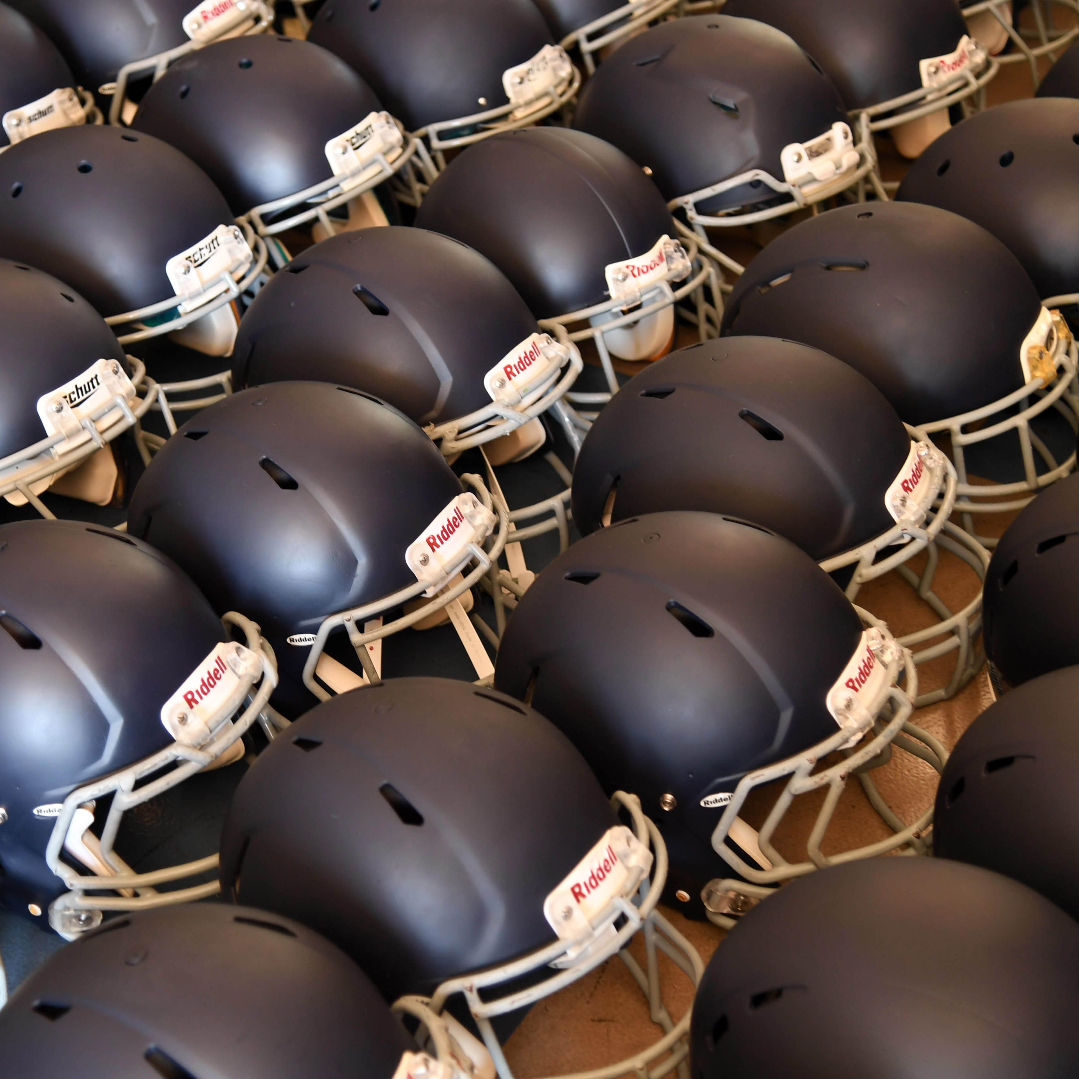 General view of high school football helmets.