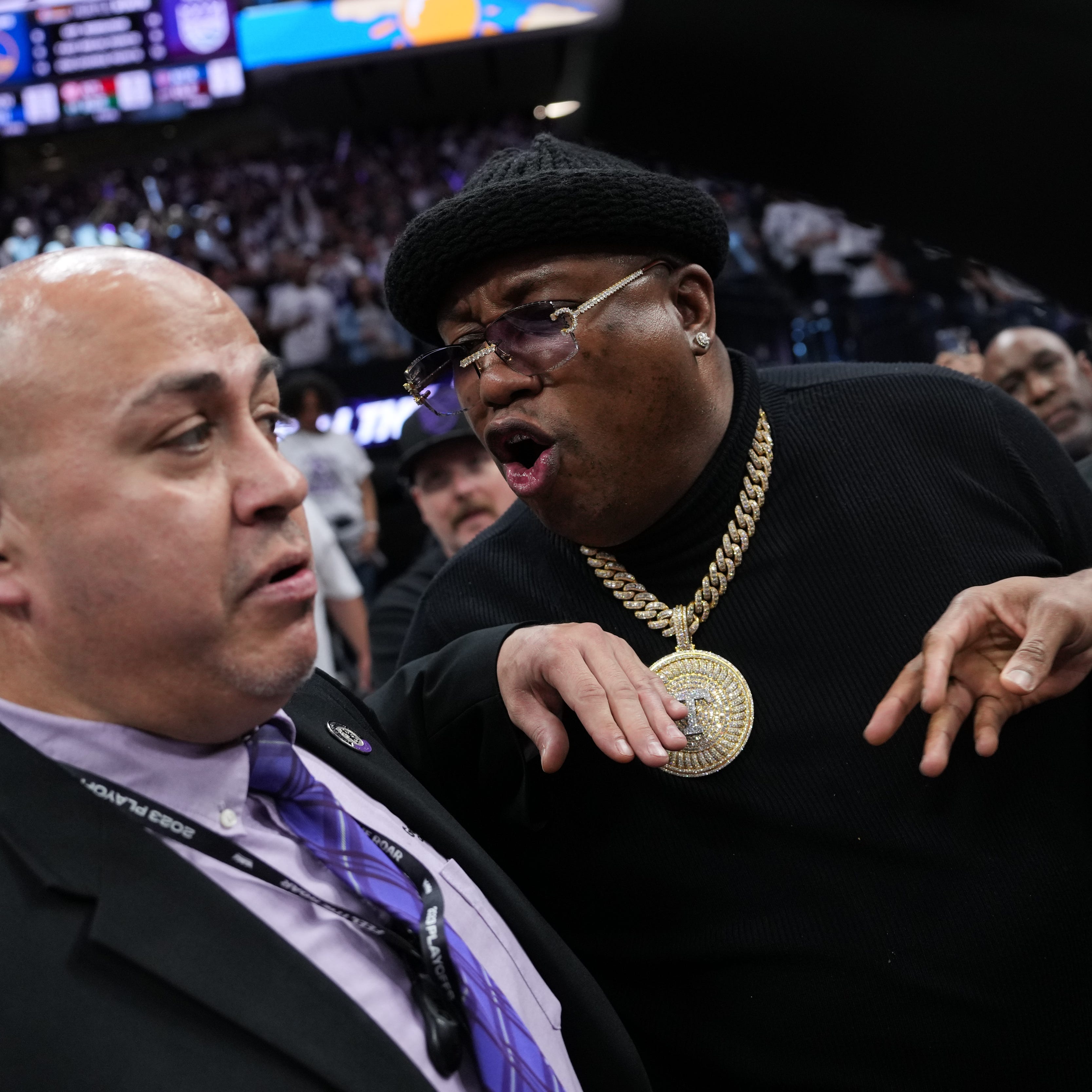 Rapper E-40 yells at arena security personnel before being escorted from courtside seating during Game 1 of the Western Conference First Round Playoffs between the Golden State Warriors and Sacramento Kings on April 15, 2023 in Sacramento, California.