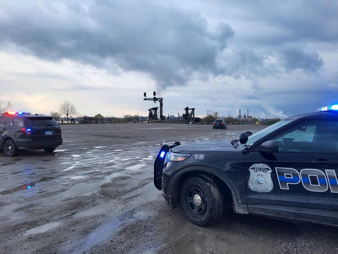 Police are investigating after a body was found along the Blue Water River Walk Saturday.