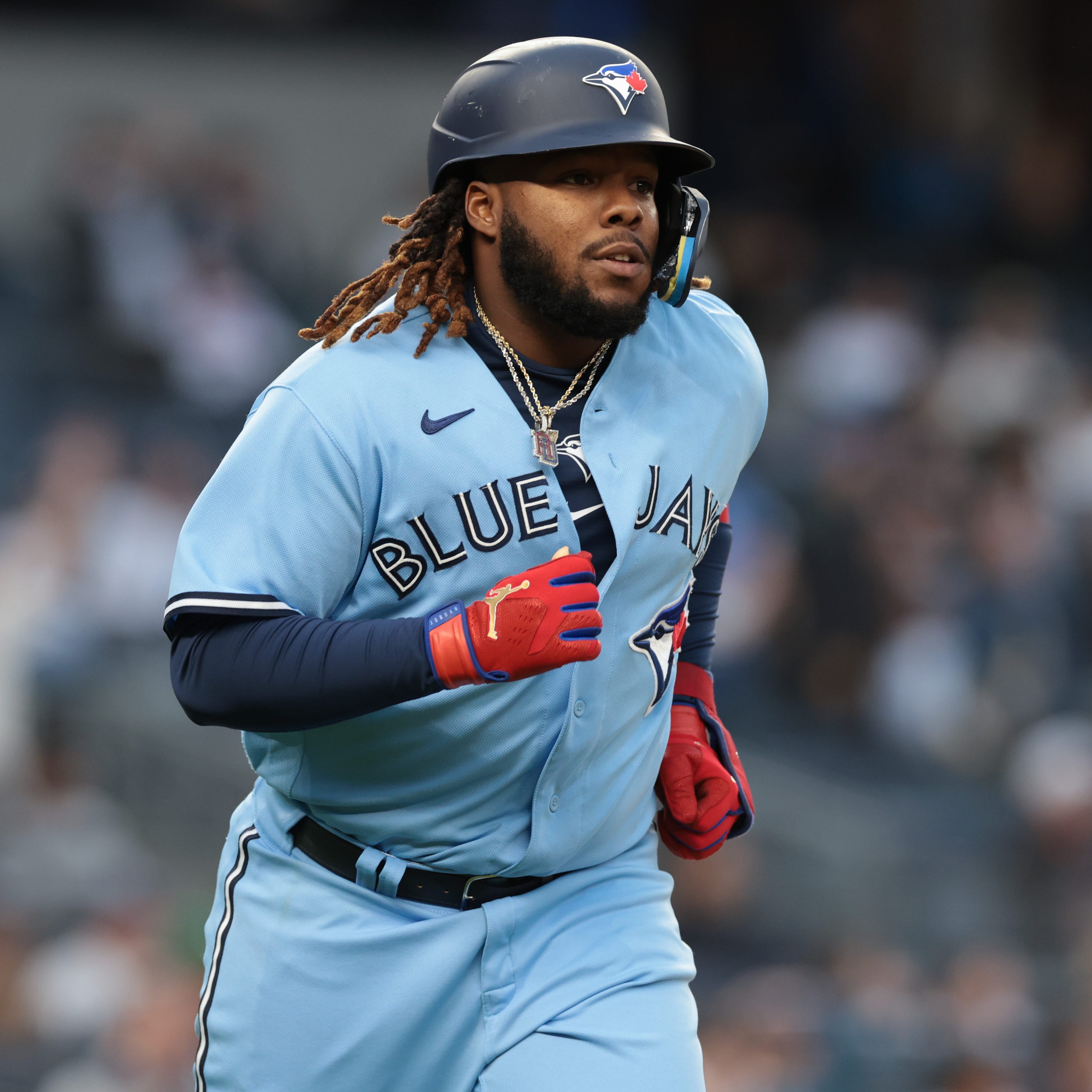 Toronto Blue Jays first baseman Vladimir Guerrero Jr. (27) rounds the bases after hitting a two-run home run during the first inning against the New York Yankees at Yankee Stadium.
