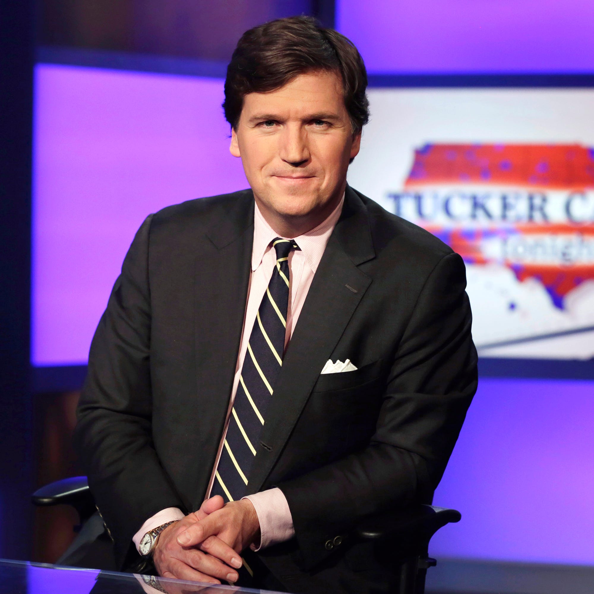 Tucker Carlson, host of "Tucker Carlson Tonight," poses for photos in a Fox News Channel studio on March 2, 2017, in New York.