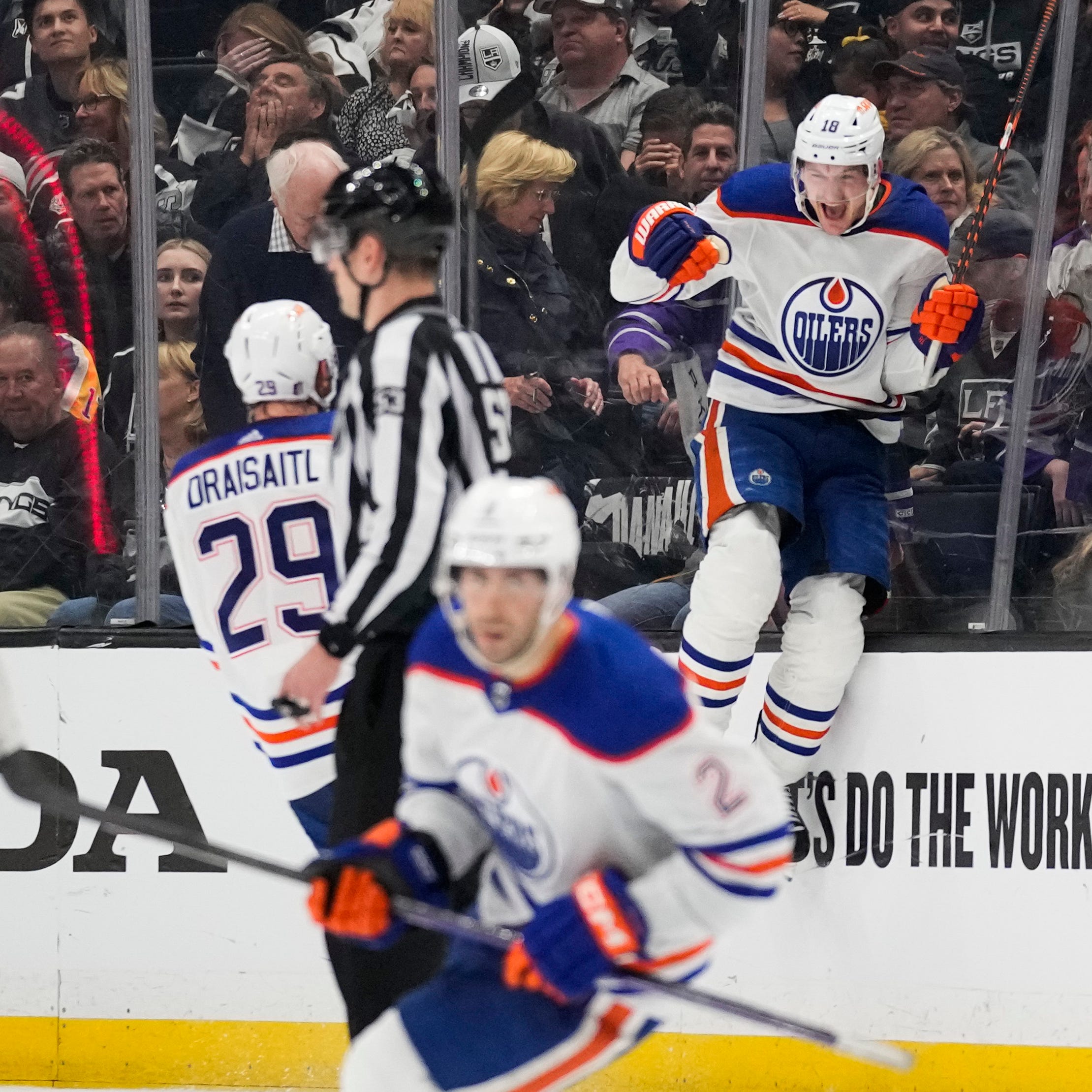 The Edmonton Oilers' Zach Hyman celebrates with Leon Draisaitl (29) after scoring during overtime against the Los Angeles Kings.