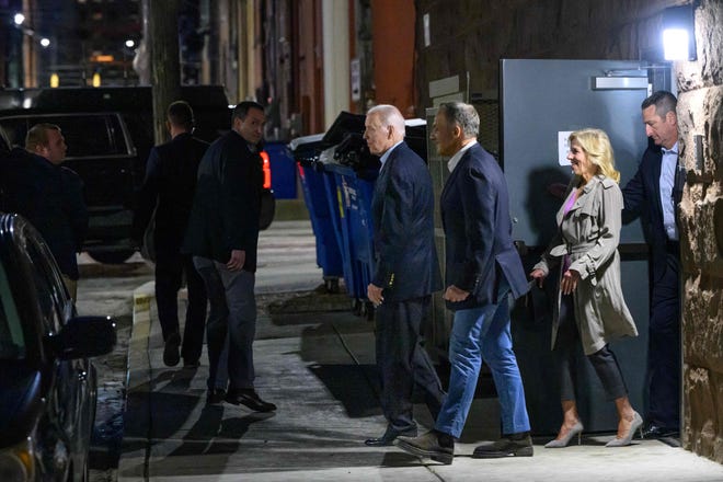 President Joe Biden, Buccini/Pollin Group co-founder and co-president Rob Buccini and First Lady Jill Biden leave The Quoin Hotel & Restaurant after dinner in downtown Wilmington on March 18, 2023.