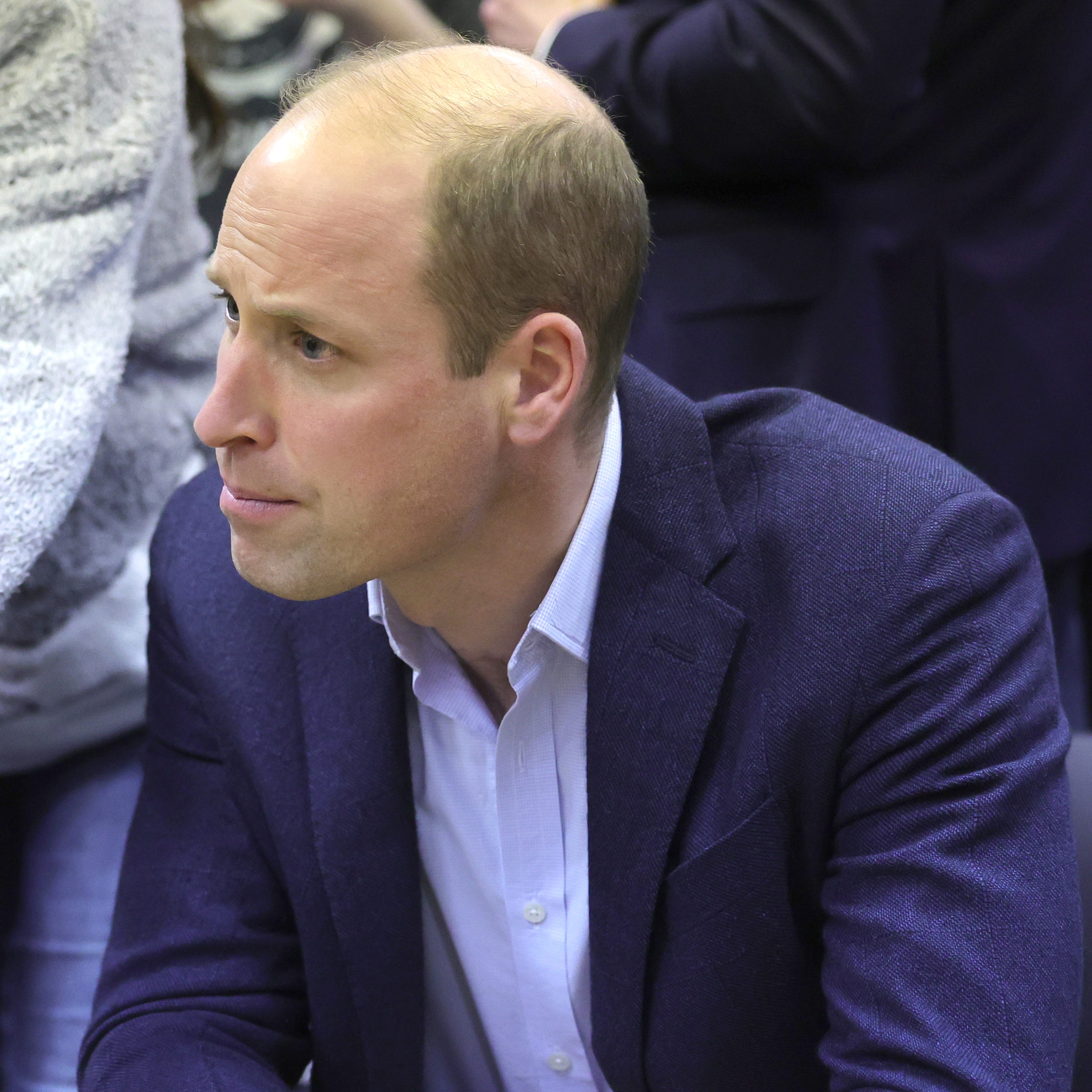 WARSAW, POLAND - MARCH 22: Prince William, Prince of Wales listens at an accommodation centre during his visit on March 22, 2023 in Warsaw, Poland. The centre, at the frontline of the humanitarian crisis, houses around 300 Ukrainian women and children and provides residents with two meals per day, while also offering a range of other services including Polish language lessons, a children's play area and psychological support. (Photo by Chris Jackson - Pool/Getty Images) ORG XMIT: 775956968 ORIG FILE ID: 1475358073