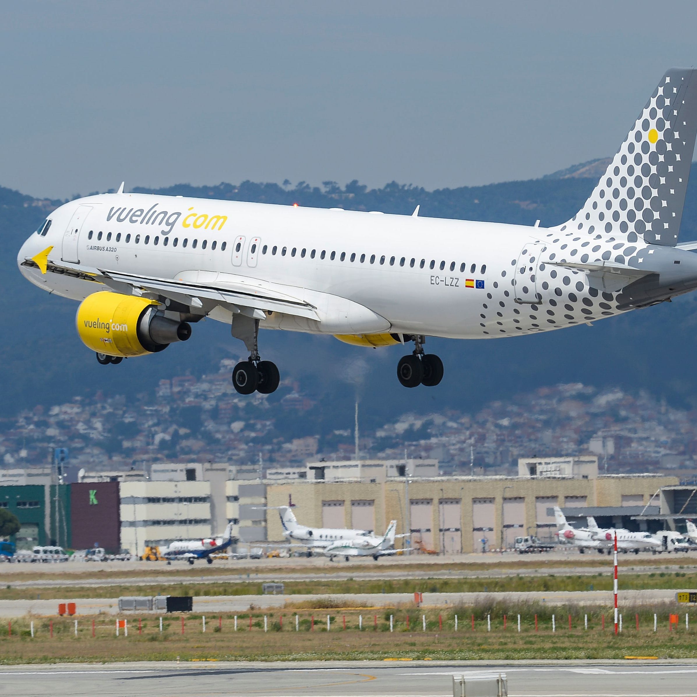 An airplane of the Spanish low-cost airline Vueling lands at Barcelona's airport in El Prat de Llobregat on June 6, 2016. (JOSEP LAGO/AFP/Getty Images)