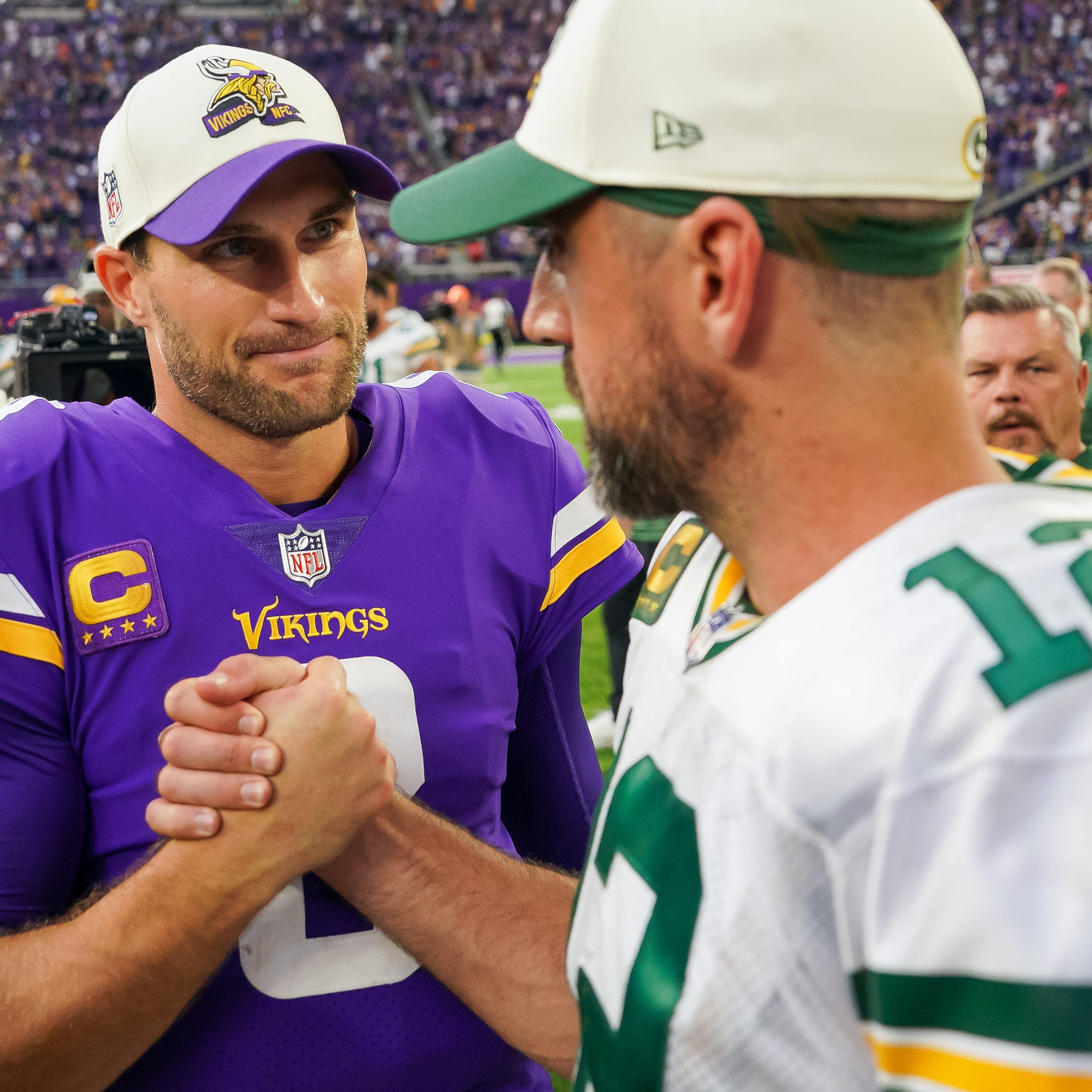 Could Minnesota's Kirk Cousins (8) join Aaron Rodgers as a former NFC North quarterback in 2024?