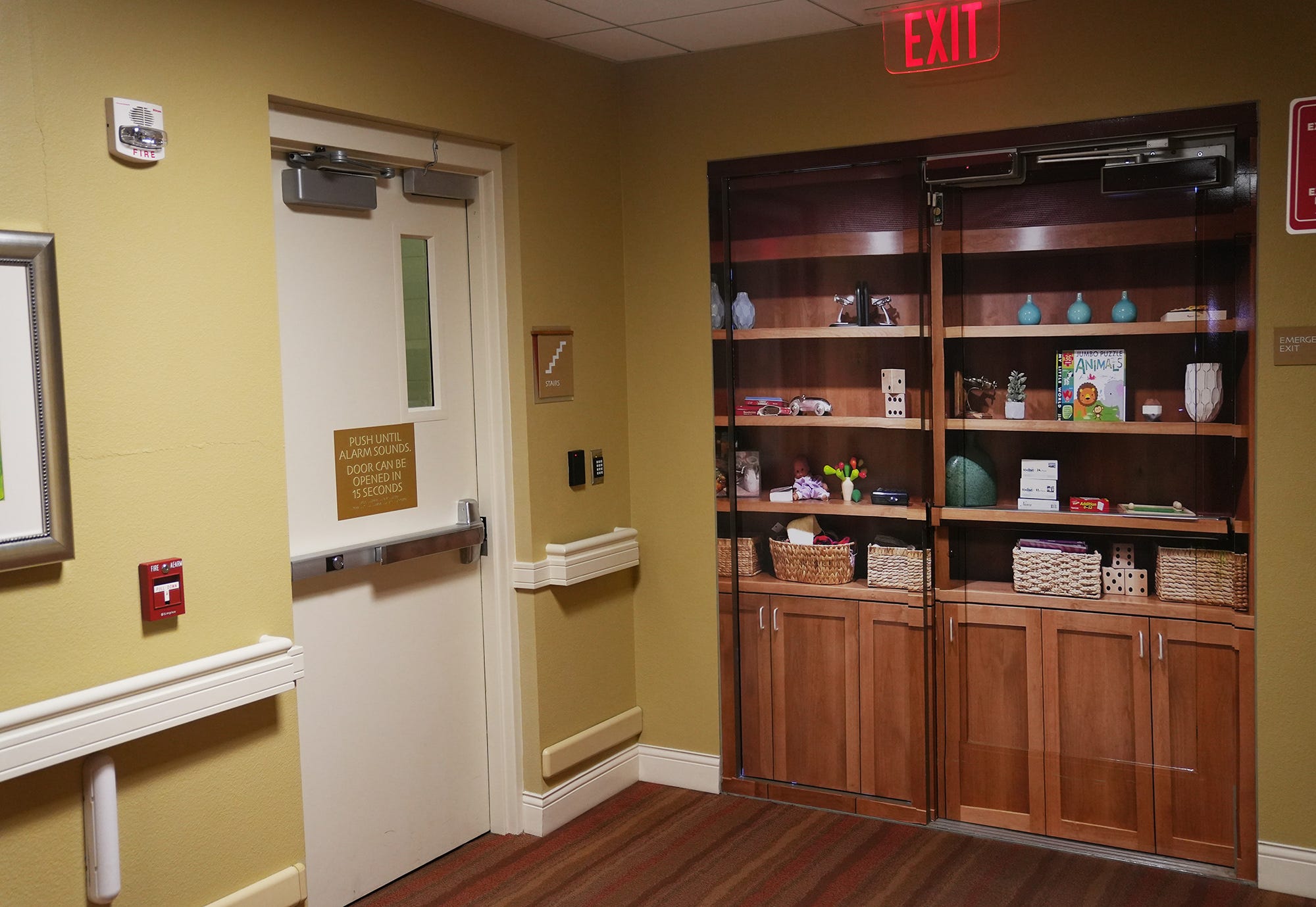 In the memory care unit of Desert Willow Assisted Living in north Phoenix, outside doors are made to look like bookshelves.