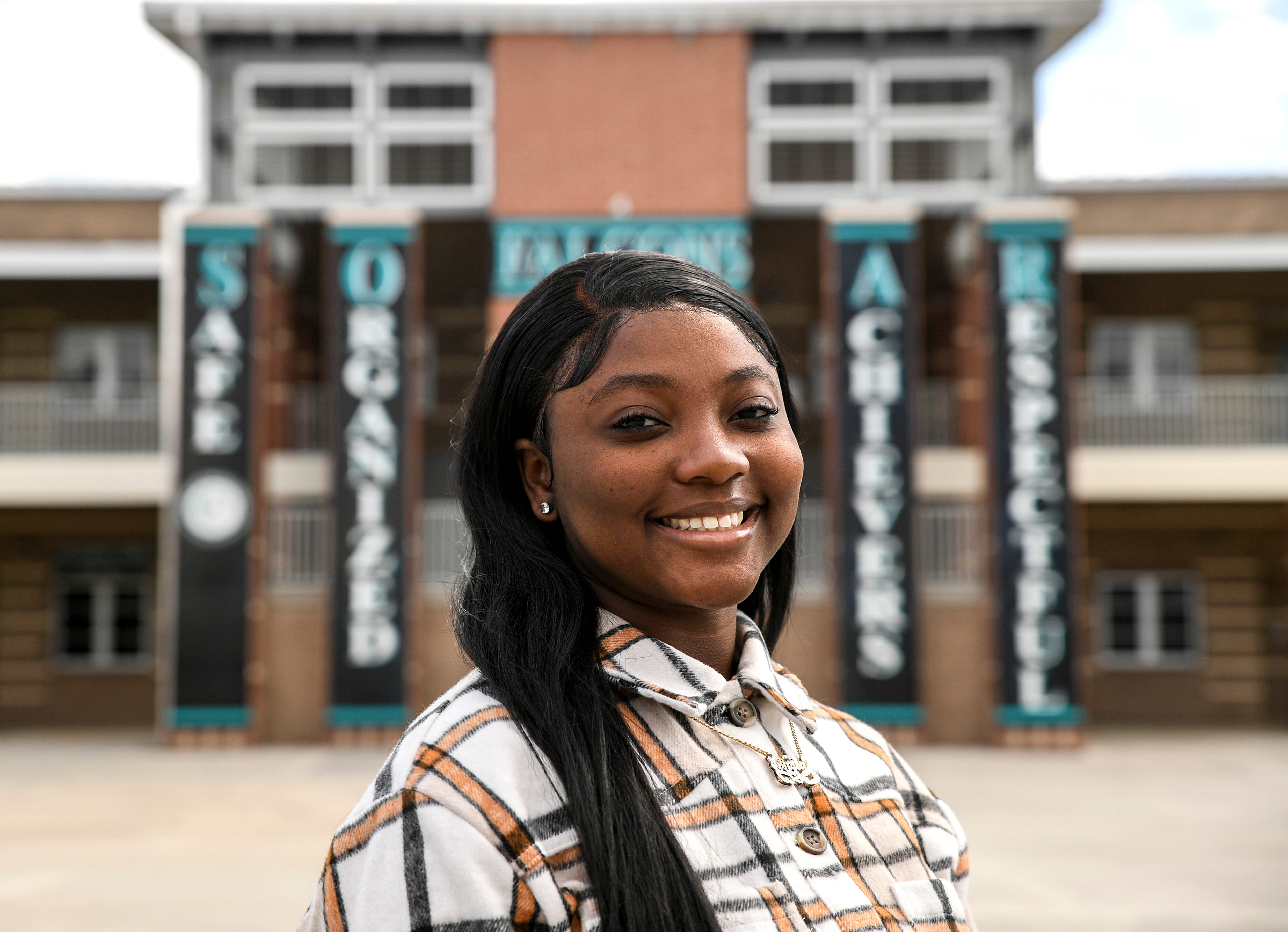 Ja'Asia Davis retook a required test for graduation over and over again, determined to end a frustrating high school experience with something to show for it.