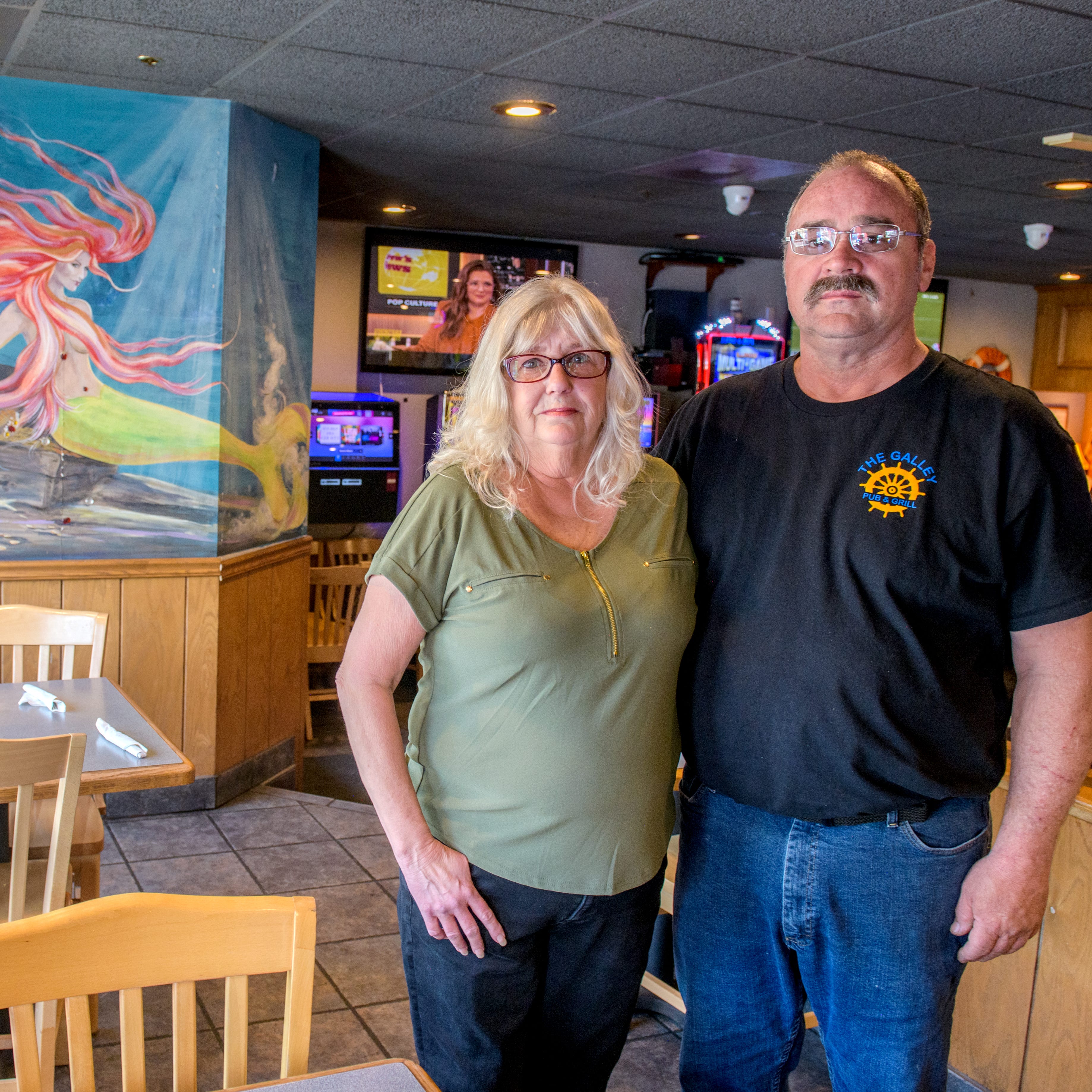 A hand-painted mural of a mermaid with a treasure chest graces a wall in the East Port Galley Restaurant and Pub behind owner Vickie Love-Freeman and her husband Jim Freeman. The couple have decided to close the restaurant and hope to sell it to someone who'll keep it running. Their last day of business is Saturday, April 29.