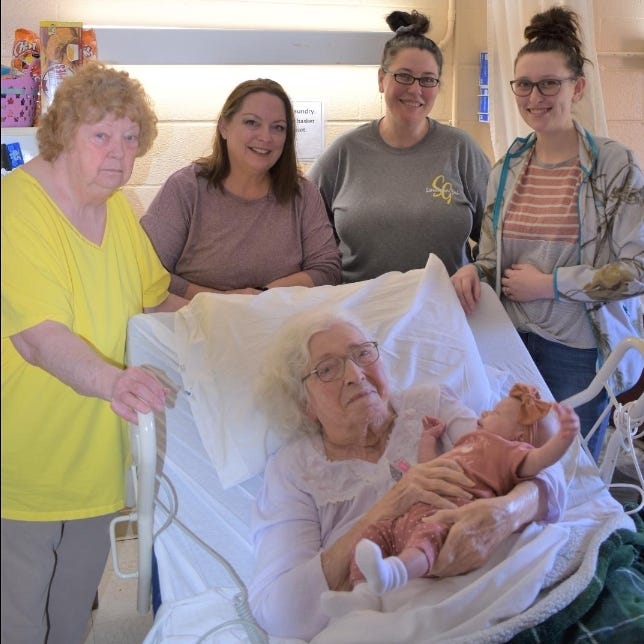 Six generations of women gathered in southern Kentucky to introduce a baby girl named Zhavia to her great-great-great-grandmother, Cordelia Mae Hawkins, 98.