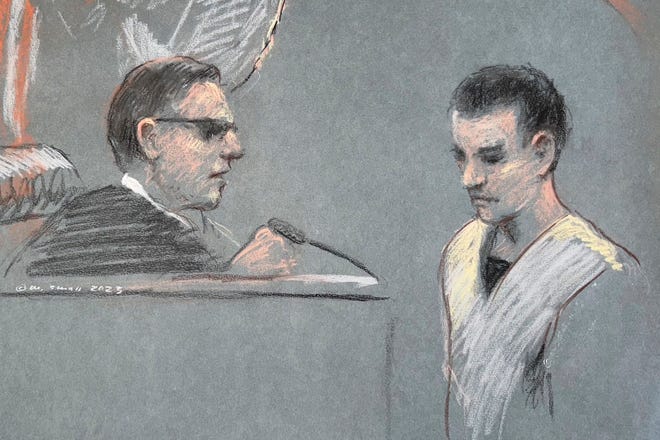 Massachusetts Air National Guardsman Jack Teixeira, right, appears in U.S. District Court in Boston. A judge is expected to hear arguments Thursday over whether Teixeira, accused of leaking highly classified military documents about the Ukraine war and other issues, should remain in jail while he awaits trial.
