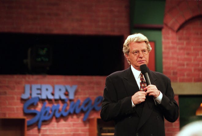 Jerry Springer on the set of his talk show in 1998. The host died Thursday in his home outside Chicago.