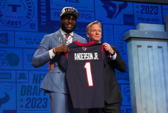 Alabama linebacker Will Anderson Jr. with NFL commissioner Roger Goodell after being selected by the Houston Texans third overall in the first round of the 2023 NFL Draft at Union Station.