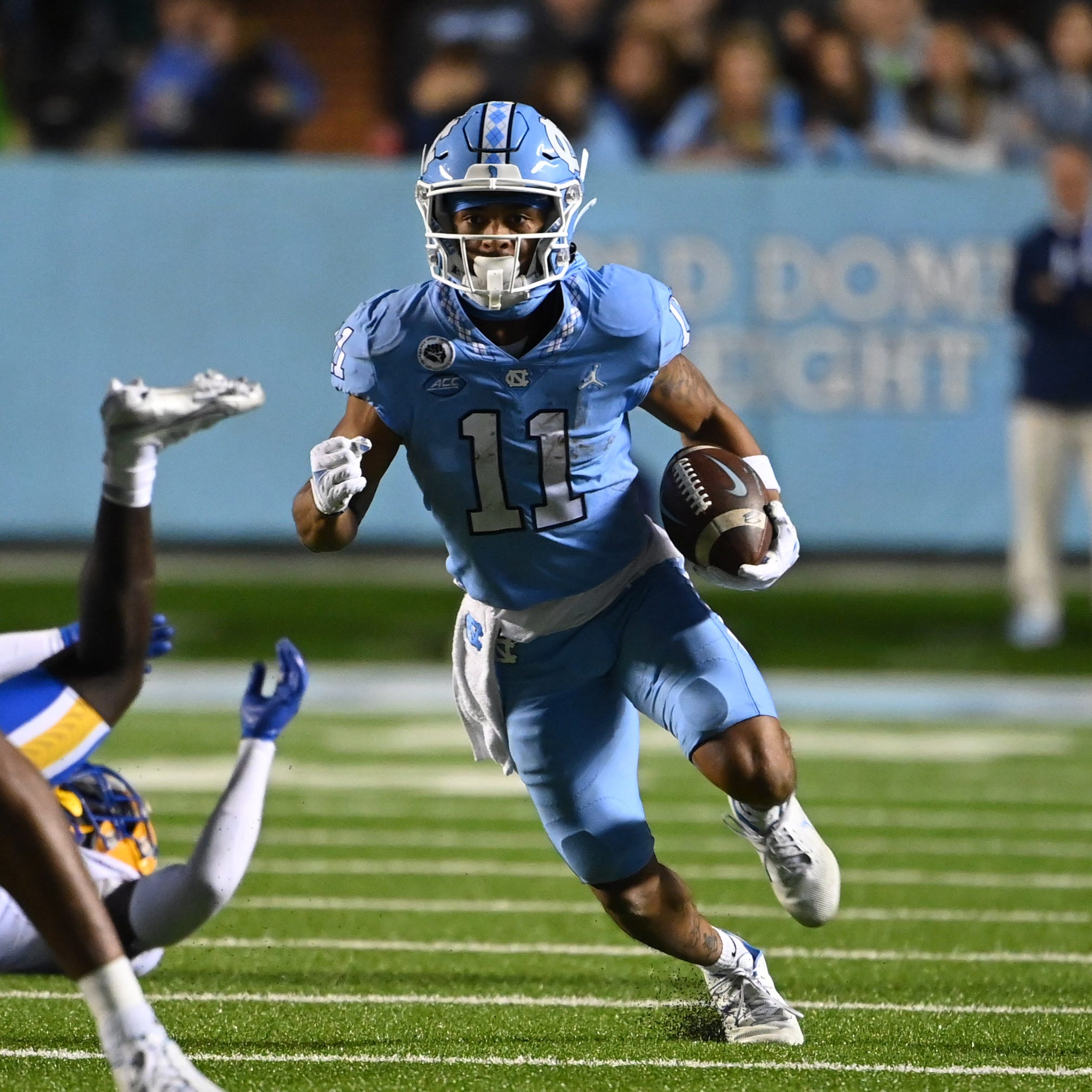 North Carolina Tar Heels wide receiver Josh Downs (11) with the ball in the fourth quarter at Kenan Memorial Stadium.