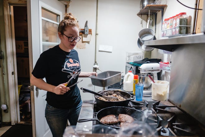 Samantha Frye cooks at Rosalie's Restaurant in Strasburg. The 18-year-old bought the diner last month from Bob and Stephanie Roth.