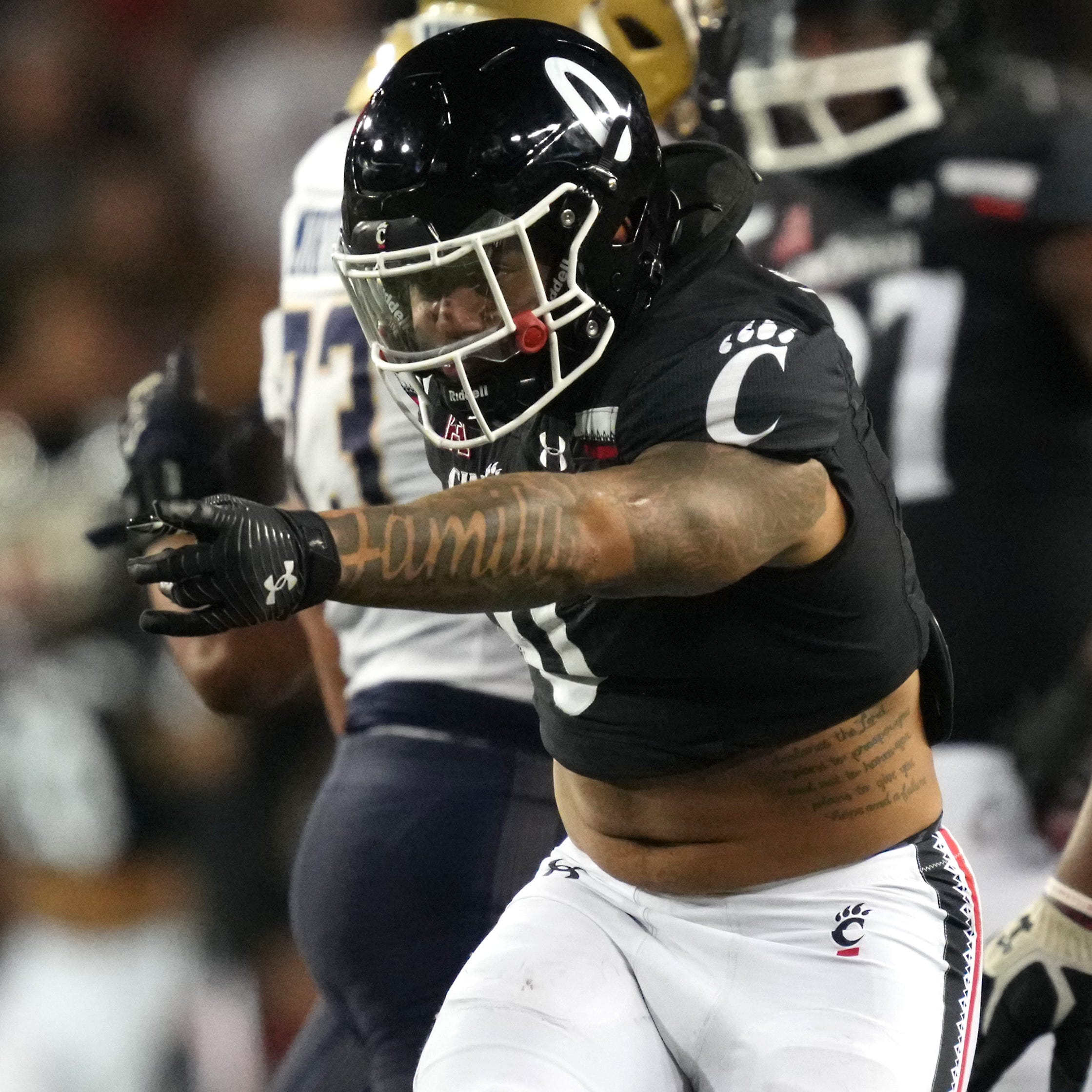 Cincinnati Bearcats linebacker Ivan Pace Jr. (0) celebrates after a sack against Navy Midshipmen quarterback Xavier Arline (not pictured) in the fourth quarter at Nippert Stadium in Cincinnati.