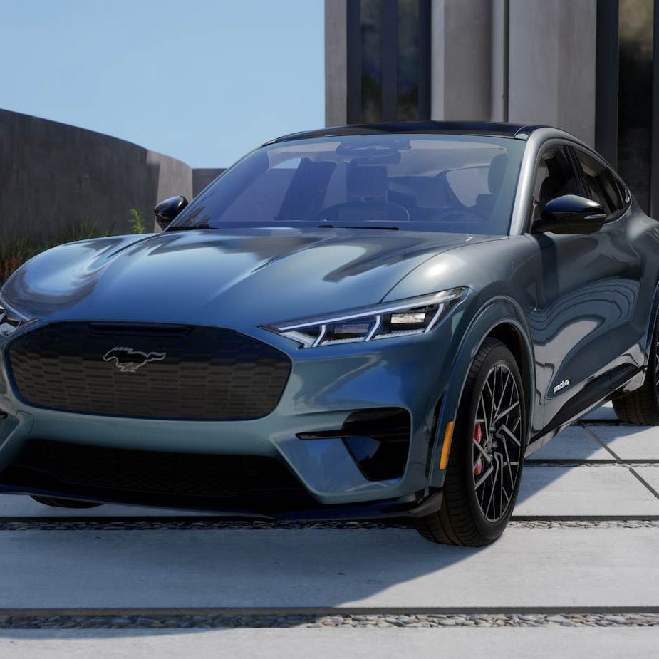The 2023 Mustang Mach-E GT, shown here in Vapor Blue, has taken another price cut as Ford Motor Company fights Tesla for electric vehicle market share.