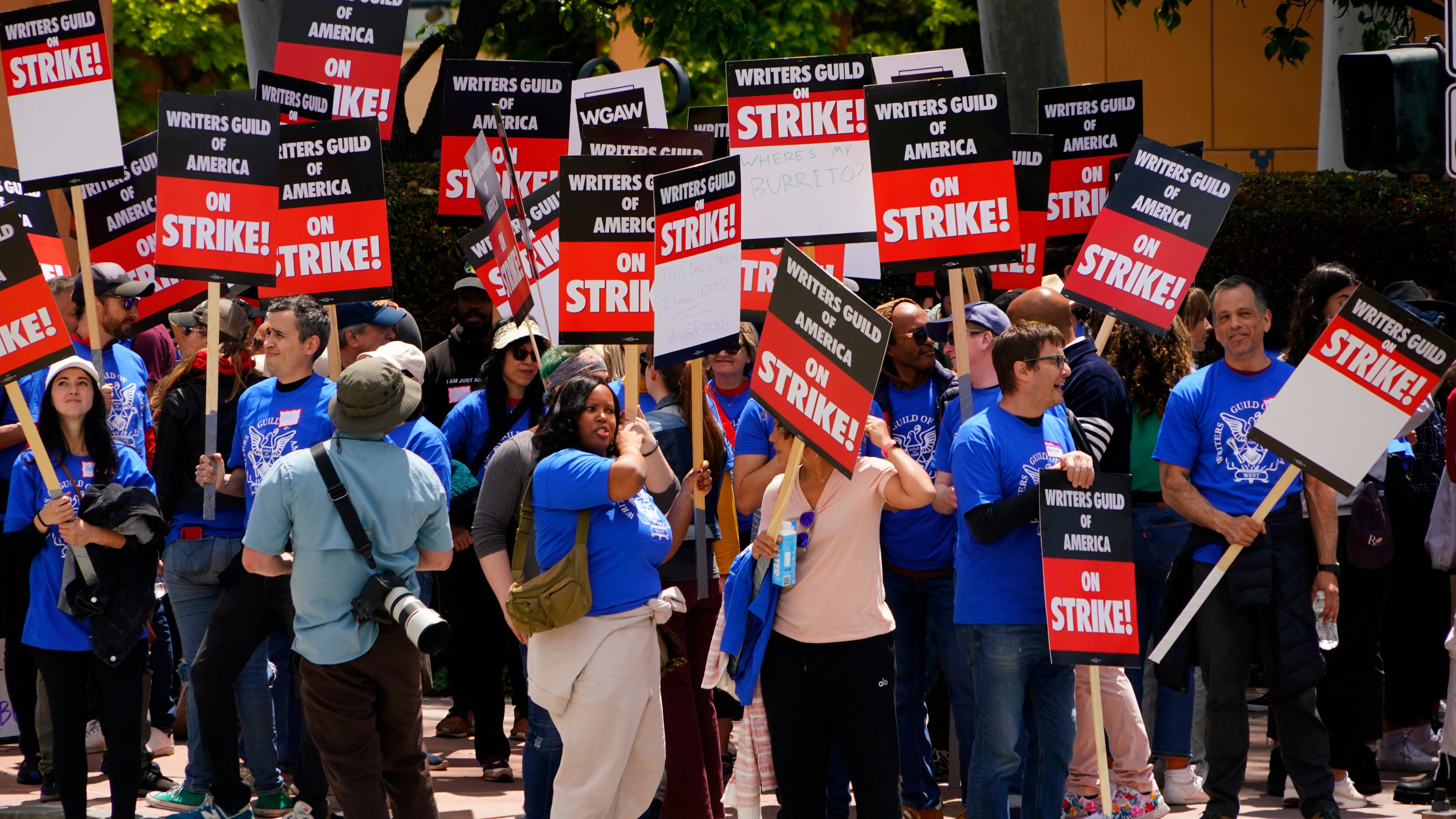 Members of the Writers Guild of America picket in front of Disney Studios on May 2, 2023. The strike comes after weeks of negotiations failed to generate a contract between the guild and the Alliance of Motion Picture and Television Producers (AMPTP), which bargains on behalf of the nine largest studios.