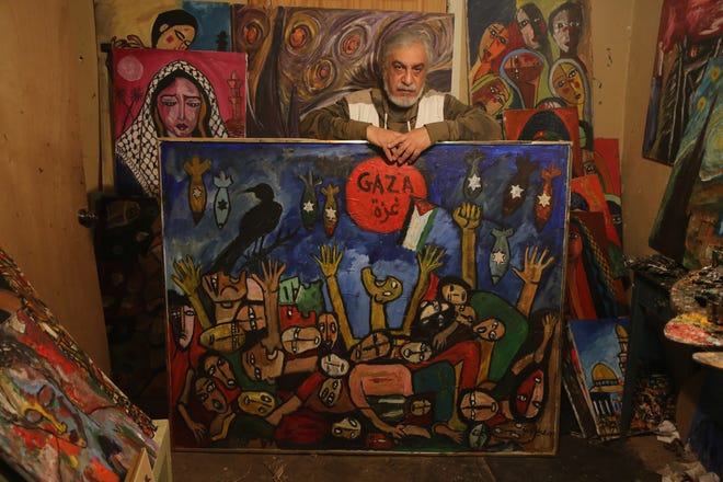 Said Elatab, an artist from Paterson, paints art depicting the struggles of the Palestinian people.