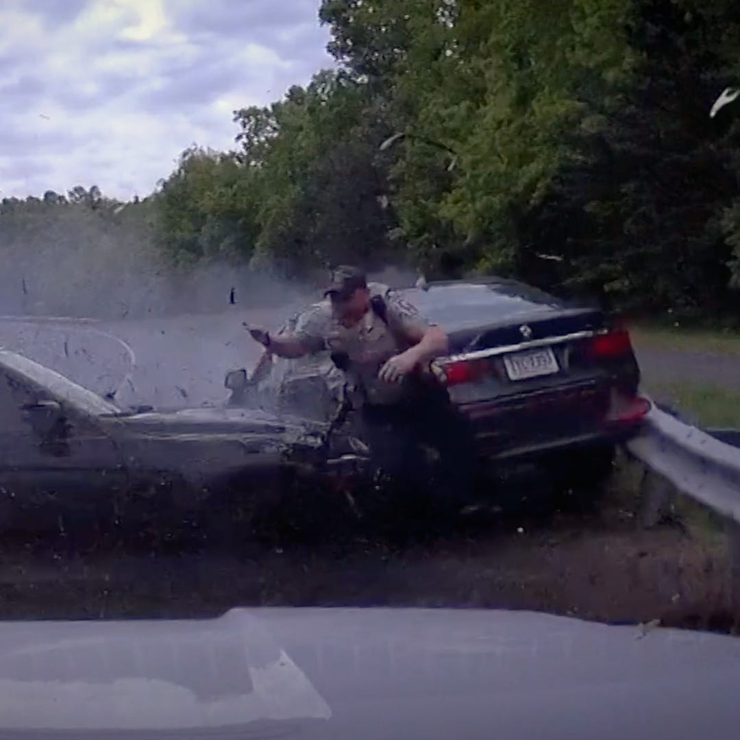 Dashcam catches Virginia police officer's narrow escape as car skids across highway