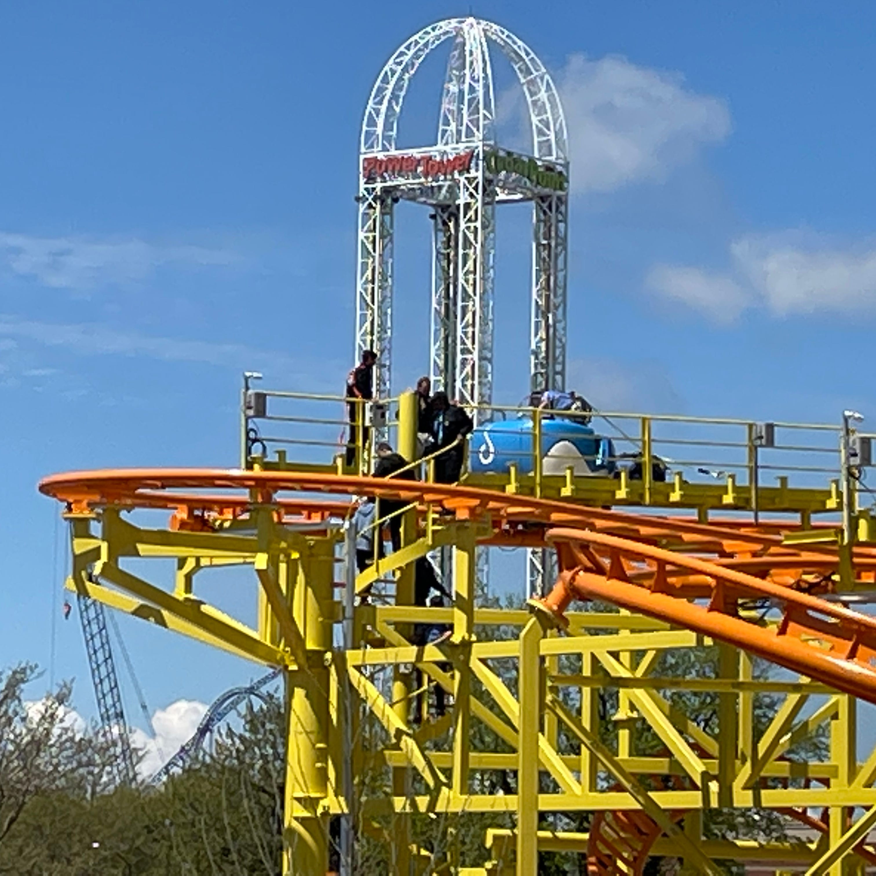 Passengers on Cedar Point's new Wild Mouse roller coaster had to be escorted off the ride Thursday after it abruptly stopped mid cycle during a preview for roller coaster enthusiasts and the media.