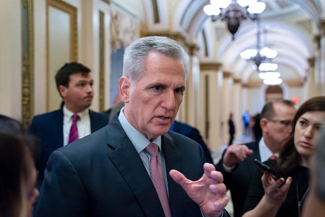Speaker of the House Kevin McCarthy, R-Calif., talks with reporters at the Capitol in Washington, April 28, 2023.