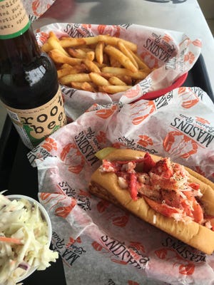 A lobster roll, a side of cole slaw, French fries and a bottle of root beer is a delightful lunch served at Mason's Famous Lobster Rolls on Rehoboth Avenue in Rehoboth Beach.