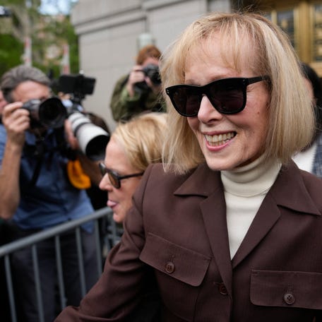 E. Jean Carroll, center, walks out of Manhattan federal court, Tuesday, May 9, 2023, in New York. A jury has found Donald Trump liable for sexually abusing the advice columnist in 1996, awarding her $5 million in a judgment that could haunt the former president as he campaigns to regain the White House. E. Jean Carroll, a New York-based advice columnist, sued Donald Trump in civil trial alleging Trump raped her in a luxury New York   department store dressing room in the 1990s.