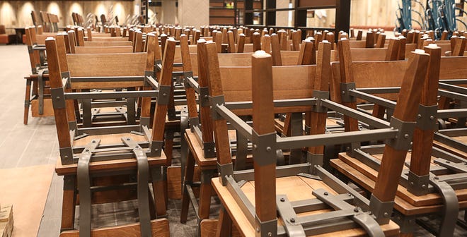 Stacked chairs in The Barnwood, a sit down breakfast/lunch spot at the Great Wolf Lodge Maryland location in Perryville, Md.