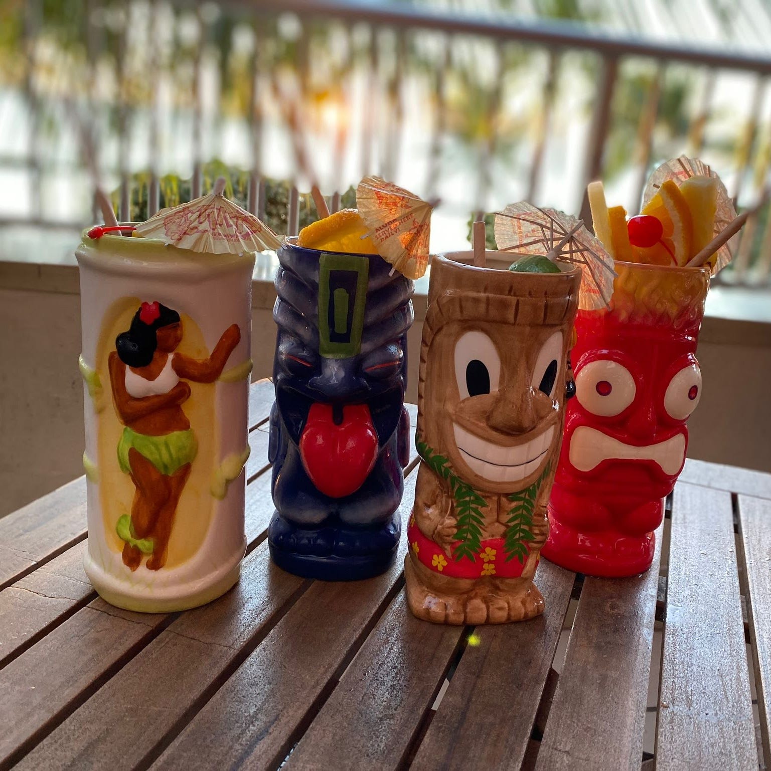 Tiki's sells drinks in cups that follow the typical tiki style.