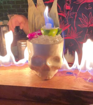 What defines a tiki bar, are they offensive? Hawaiians reclaim them.