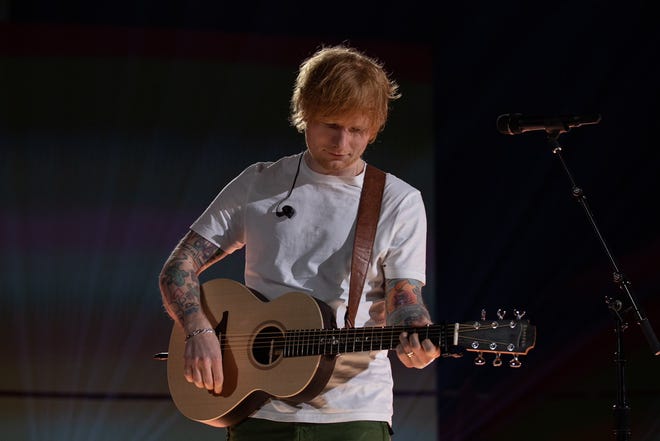 Ed Sheeran rehearsing onstage at 2023 ACM Awards