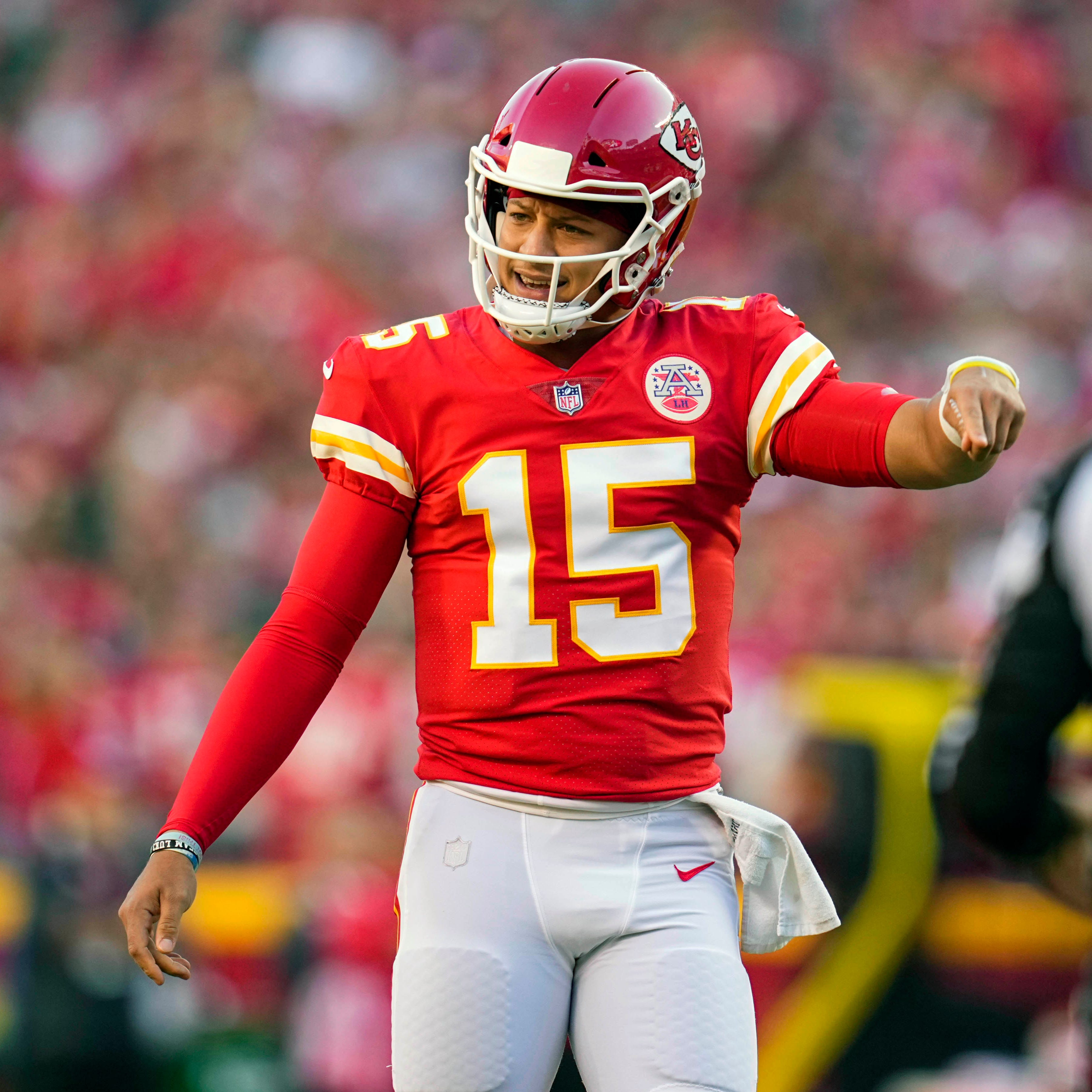 Kansas City Chiefs quarterback Patrick Mahomes (15) reacts after a play against the Green Bay Packers during the first quarter at GEHA Field at Arrowhead Stadium.