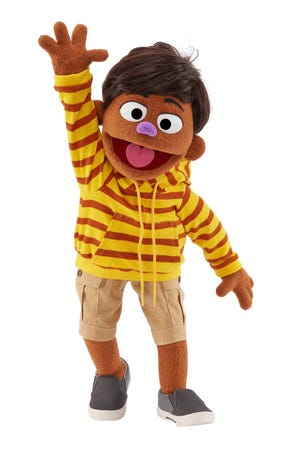 TJ, a 4-year-old Filipino-American muppet. He was introduced on Sunday, May 7, 2023.