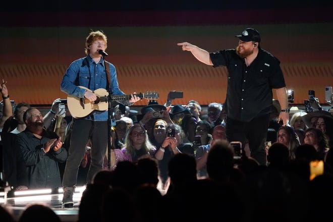 Ed Sheeran and Luke Combs perform during the 58th ACM Awards at the Ford Center at the Star in Frisco Texas, on Thursday, May 11, 2023.