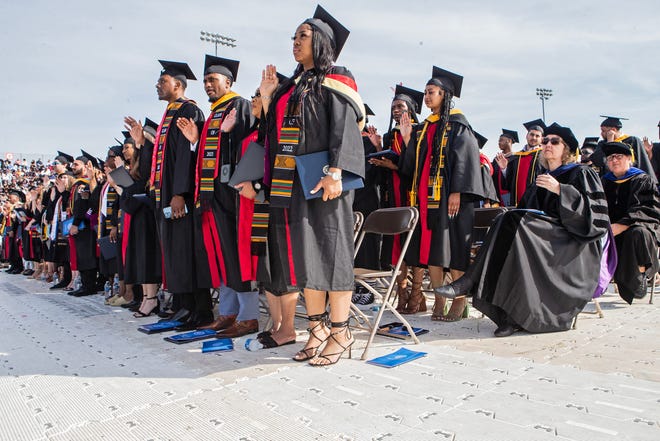 Graduating underclassmen take their oaths during the Delaware State University 2023 commencement ceremony at Alumni Stadium in Dover, Friday, May 12, 2023.
