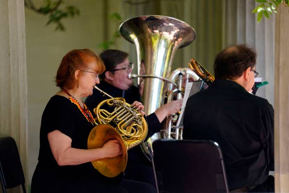 Andrea Menousek plays the french horn with the New Jersey Symphony Chamber Players during their performance honoring Mother's Day at the Van Vleck House and Gardens in Montclair on Sunday, May 14, 2023.