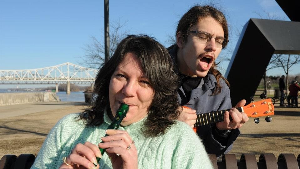Lauren Atkins and her son, Joshua, play around at a park in Louisville, Kentucky, in 2011. Joshua, an avid BMX biker who loved outdoors activities, music and photography, died at 31 in 2018 while refinishing his bike with paint stripper.