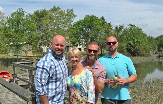 Drew Wynne (right), and his mother Cindy, with brothers, Brian and Clayton Wynne pose for a family picture at their home in South Carolina in 2017. He died that year from exposure to a paint remover.