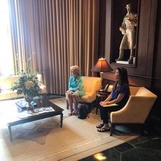 Cindy Wynne (left) and Wendy Hartley await a meeting with then-EPA Administrator Scott Pruitt in 2018. They each lost a son to methylene chloride exposure in 2017, the year Pruitt’s EPA shelved a proposed ban on the products that killed the men.