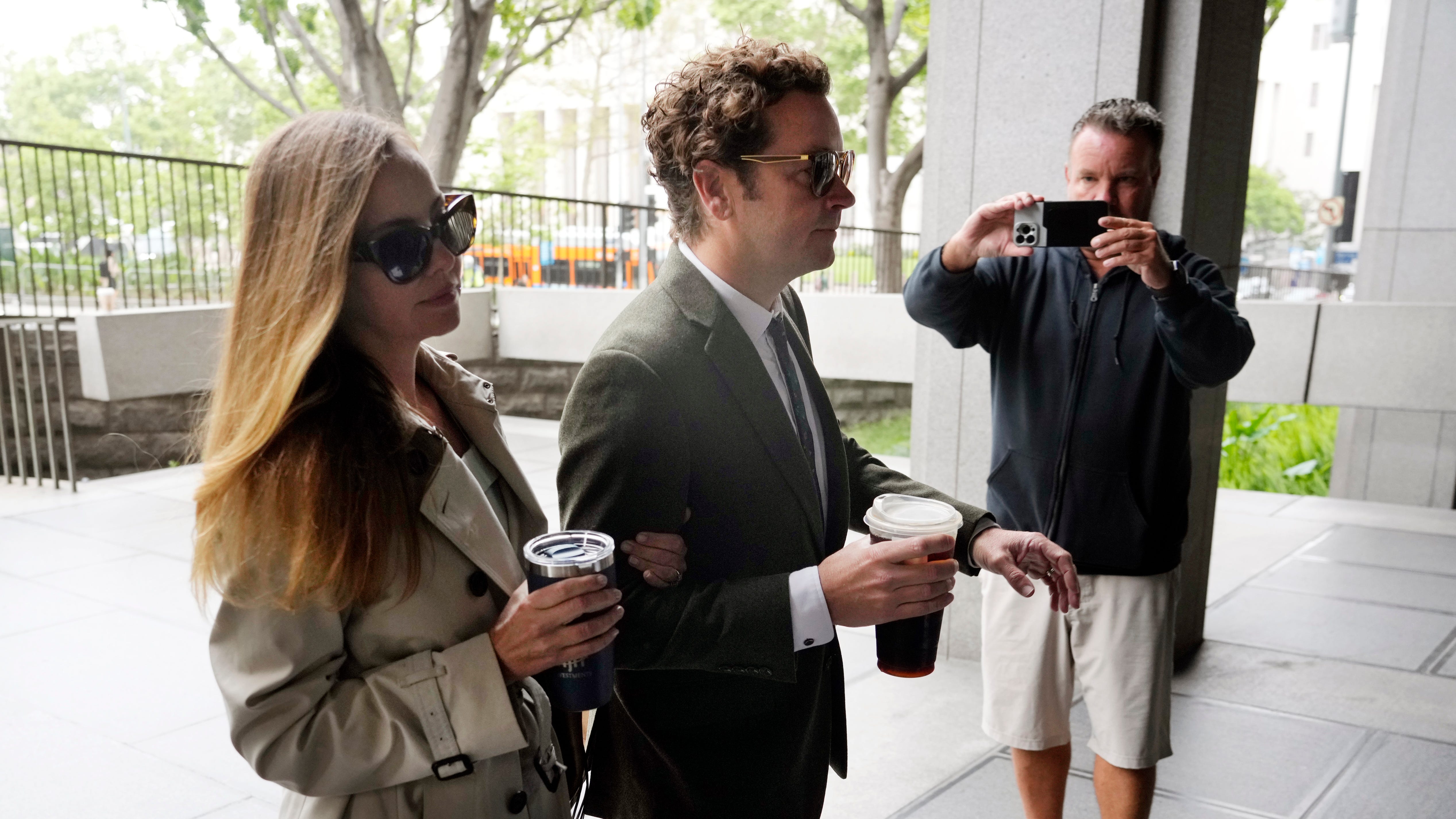Danny Masterson and his wife Bijou Phillips arrive for closing arguments in his second trial, Tuesday, May 16, 2023, in Los Angeles. Masterson is charged with raping three women at his Los Angeles home between 2001 and 2003. (AP Photo/Chris Pizzello) ORG XMIT: CACP109