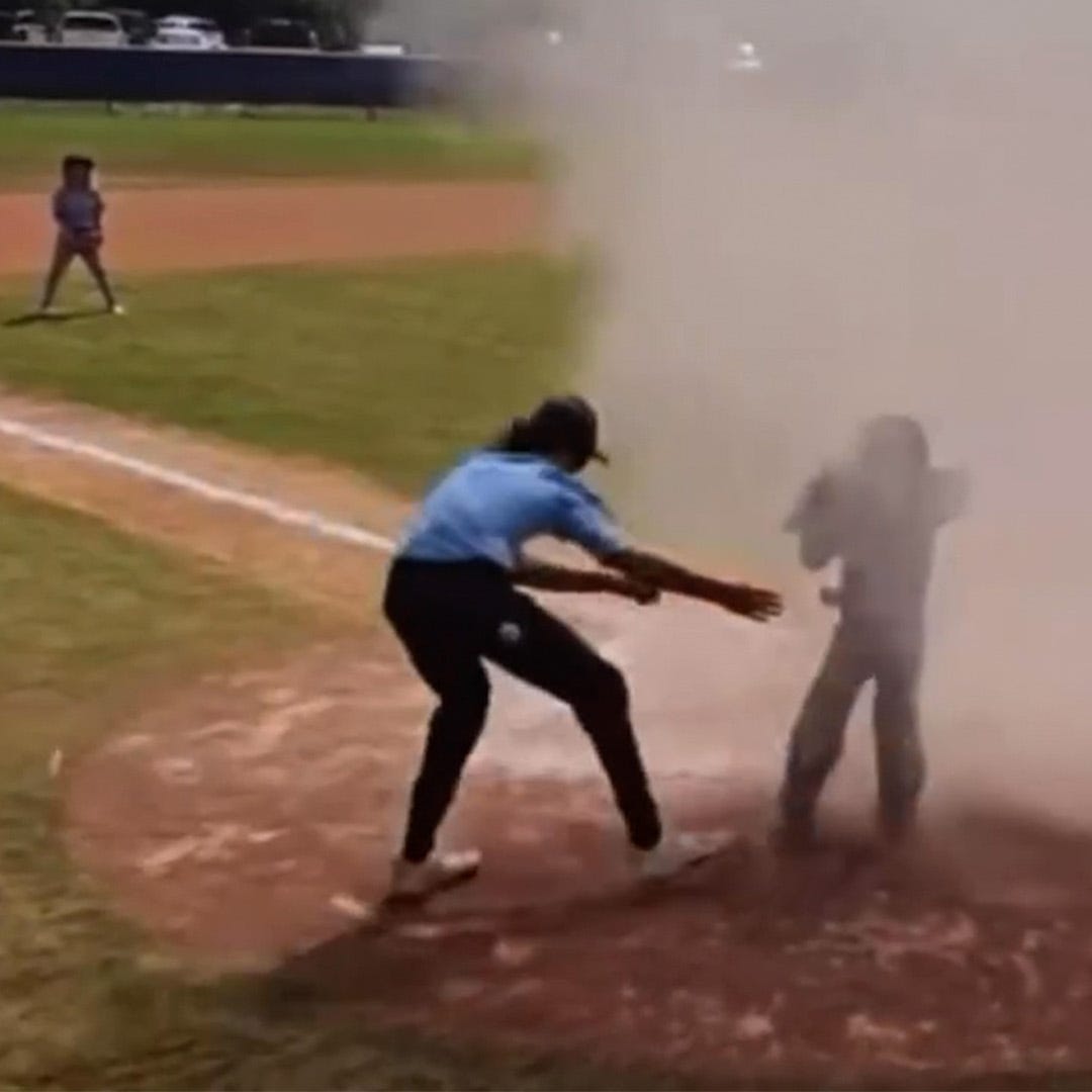 The 7-year-old catcher got caught in a dust devil behind home plate when the quick-thinking umpire jumped in and pulled him out.